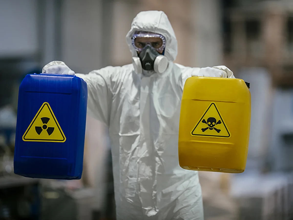 Biohazard cleanup technicians in protective equipment at a remediation scene in Gallatin, TN